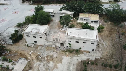 Fototapeten Verlassene Gebäude aerial view of the abandoned and inactive factory buildings near the city  © abu