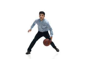 Boss. Man in office clothes playing basketball on white background like professional player, sportsman. Unusual look for businessman in motion, action with ball. Sport, healthy lifestyle, creativity.