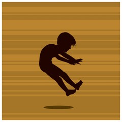 Fototapeta na wymiar silhouette of boy jumping