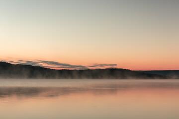 Sunrise on the lake in summer season