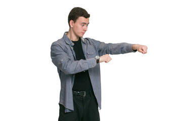 A young man in a Manatee shirt, black t-shirt and trousers, isolated on white