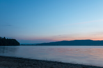 Sunrise on the lake in summer season