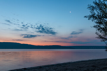 Sunrise on the lake in summer season
