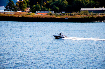 Speedboat off Bainbrige island in Puget Sound part of the city of Seatle USA