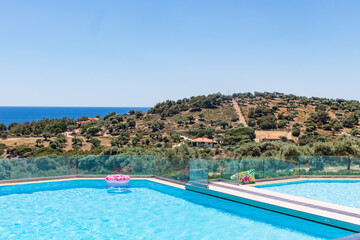 View of swimming pool in hotel resort in Greece