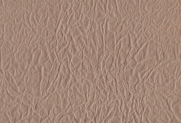 Sheet of crumpled brown craft paper background. Extra large highly detailed image.