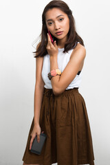 Fototapeta premium Studio shot of young beautiful Asian woman
