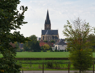 Fototapeta na wymiar Church in Thorn the Netherlands photo with a sky background