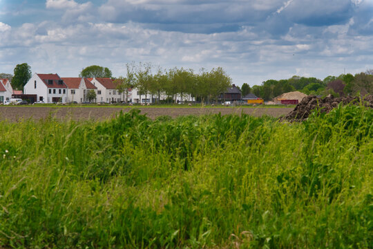 rural landscape with houses photo  form Laar the Netherlands  in the summer with a blue cloudy sky