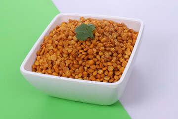Fried and Spicy Chana Masala Dal in white bowl, Chana Dal is a very popular Gujarati snack