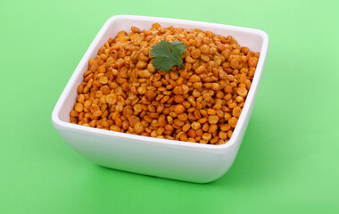 Fried and Spicy Chana Masala Dal in white bowl, Chana Dal is a very popular Gujarati snack