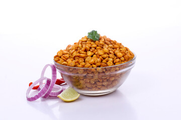 Fried Salted Chana Dal, Glass bowl on white background, Chana Dal Masala is a popular Chakna recipe