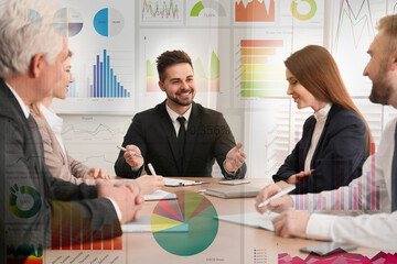 Business people having meeting in office and digital graphics. Modern technology