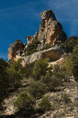 Fototapeta na wymiar Rock formation at the hiking track from Aragosa to La Cabrera in park Barranco del Rio Dulce, Guadalajara, Spain 