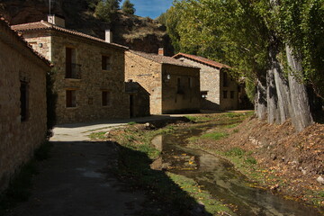 Fototapeta na wymiar Village La Cabrera in park Barranco del Rio Dulce, Guadalajara, Spain 