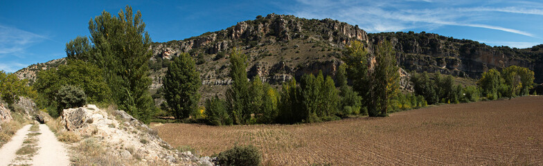 Fototapeta premium Landscape at the hiking track from Aragosa to La Cabrera in park Barranco del Rio Dulce, Guadalajara, Spain 
