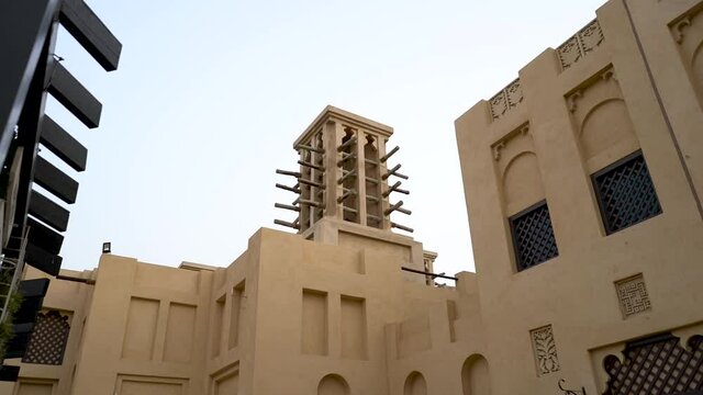 Traditional Windtower Architecture At Souk Madinat Jumeirah In Dubai, UAE - low angle shot