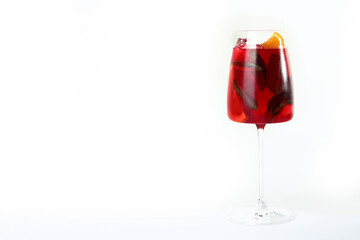 Orange and strawberry lemonade with mint leaves. Non-alcoholic drink. Summer season. Isolated object. Copy of the space.