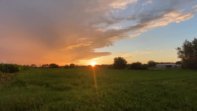 wonderful sunset in the fields timelapse