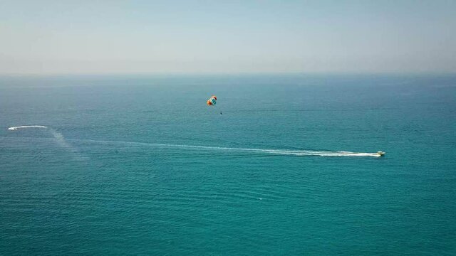 Man parasailing in Greece sea