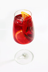 Orange and strawberry lemonade with mint leaves. Non-alcoholic drink. Summer season. Isolated object. Copy of the space. Top view.Vertical photo.
