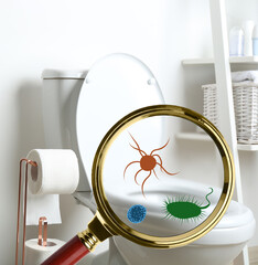 Magnifying glass and illustration of microbes on toilet bowl in bathroom