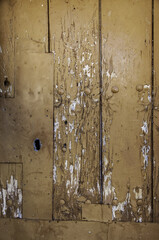 Old brown wooden door with lock