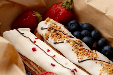 Fresh eclair cakes in a cardboard box