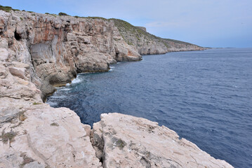 Fototapeta na wymiar WILD BEACHES AND RUGGED SCENERY ON THE ISLAND OF VIS IN CROATIA. ADRIATIC SEA COASTLINE.