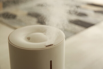 Modern humidifier indoors, closeup view. Home appliance
