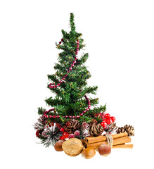 Little christmas tree with decorations isolated on a white background.