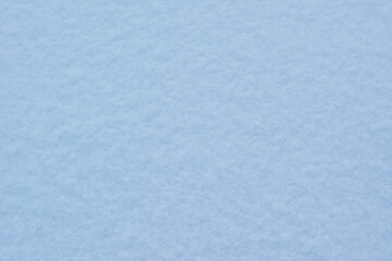 Obraz premium Close-up of snow texture in winter on the banks of a frozen river.