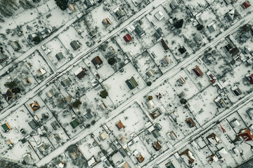 Top view of country houses in winter