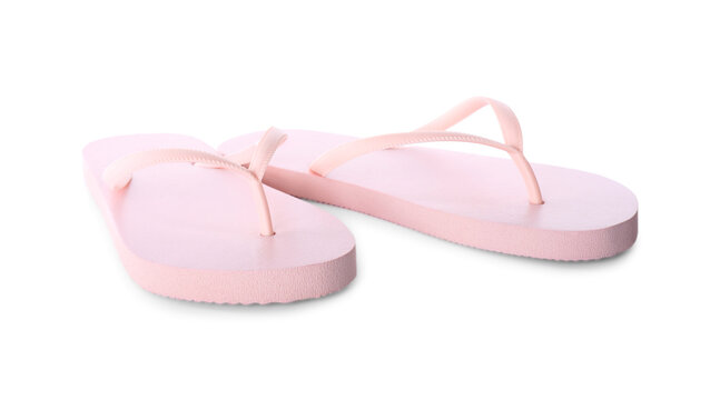 Light pink flip flops isolated on white. Beach accessory