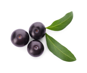 Fresh acai berries with leaves isolated on white, top view