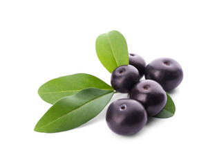 Fresh acai berries with leaves isolated on white
