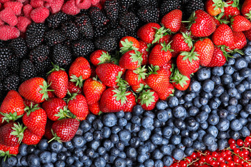 Mix of different ripe tasty berries as background, top view © New Africa