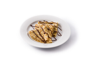 Sweet crepes with chocolate isolated on white background
