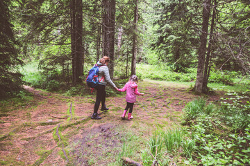 Obraz premium Family hiking in beautiful summer forest, Healthy Active Lifestyle , Mother And Daughter Walking In Nature