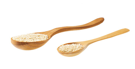 sesame seeds on a wooden spoon isolated on white background .