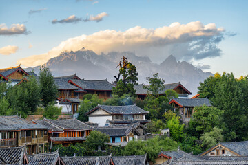 Fototapeta na wymiar Traditional Chinese tile roofs of authentic houses, Lijiang