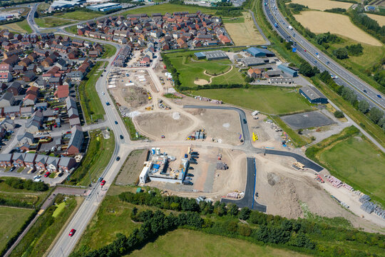 Aerial view of new houses being built / constructed by Persimmons in Bridgwater, Somerset UK.