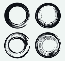 Set of four round grunge shapes