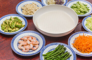 Rice paper and ingredients for making vietnamese style spring rolls