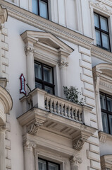 Facade Of An Old Building With Balcony And Funny One Way Sign In The City Of Vienna In Austria