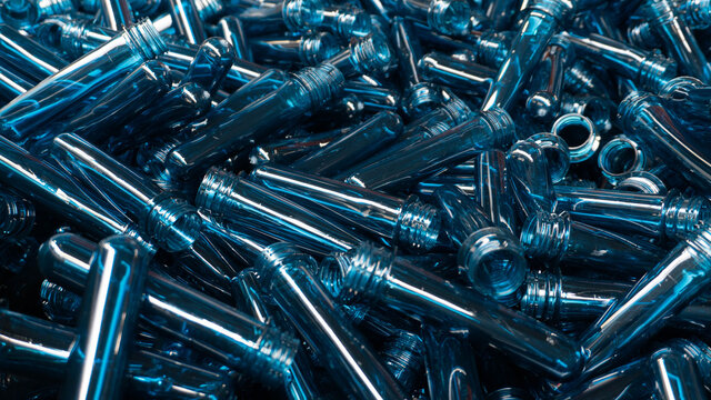 New Plastic Bottles in making - blue PET Preform before blowing  