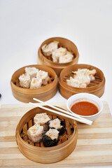 Steamed dumplings Chinese Dim Sum on white background