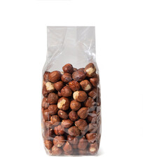 Fototapeta premium Hazelnuts in Plastic Package, without Shell - Close-Up - Isolated on White Background