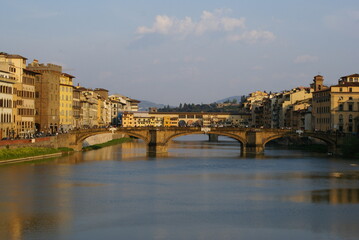 Florence, Italy: Santa Trinita bridge and Ponte Vecchio bridge in the background