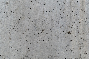 cracks, stains and scratches on cement - concrete wall close-up